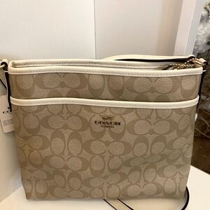 Coach Cream Crossbody Bag with Signature Pattern and Leather Straps